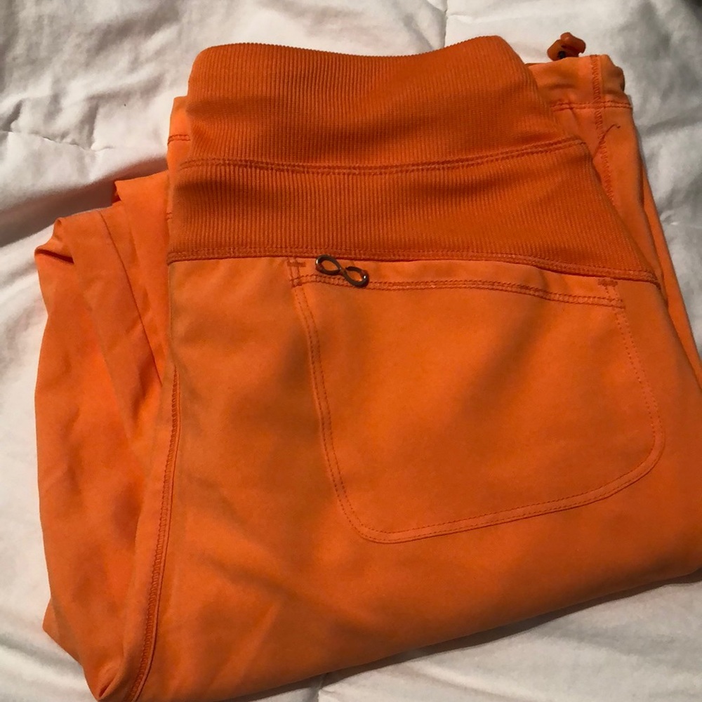 Never Worn orange scrub bottoms